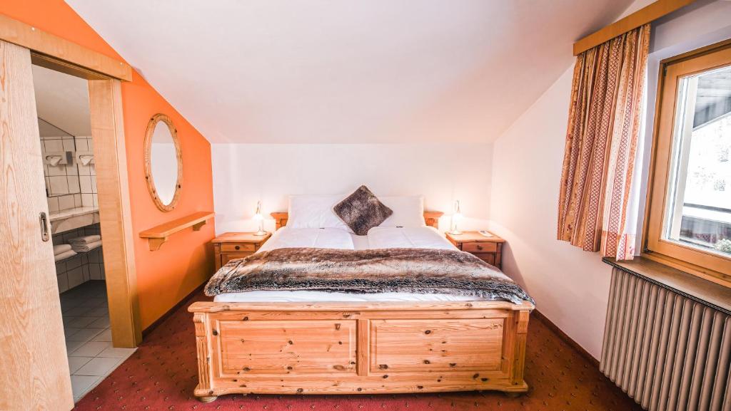 Postel nebo postele na pokoji v ubytování Hotel Guesthouse Dalnig