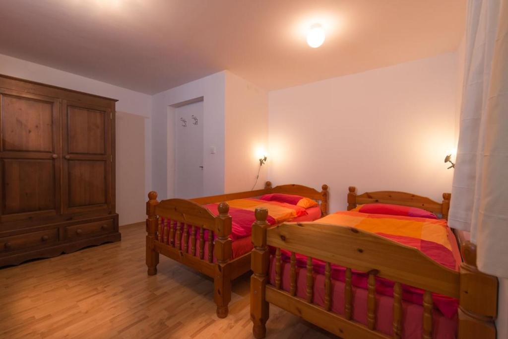 Voodi või voodid majutusasutuse House Jelenko toas