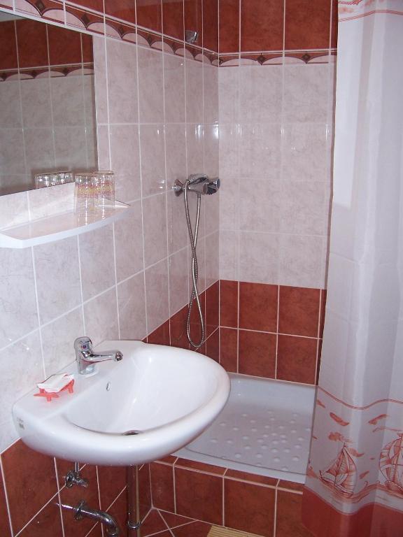 Koupelna v ubytování Penzion Haus Regrus