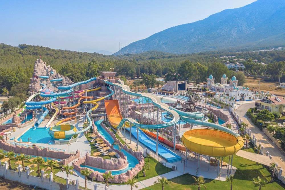 an amusement park with a large water slide at Orka World Hotel & Aquapark in Oludeniz