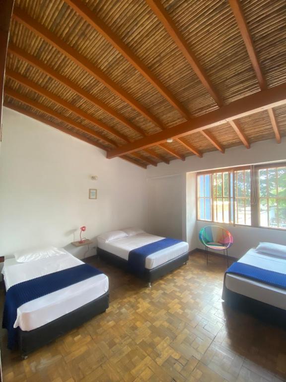 Postel nebo postele na pokoji v ubytování Yolo Hostel Medellin