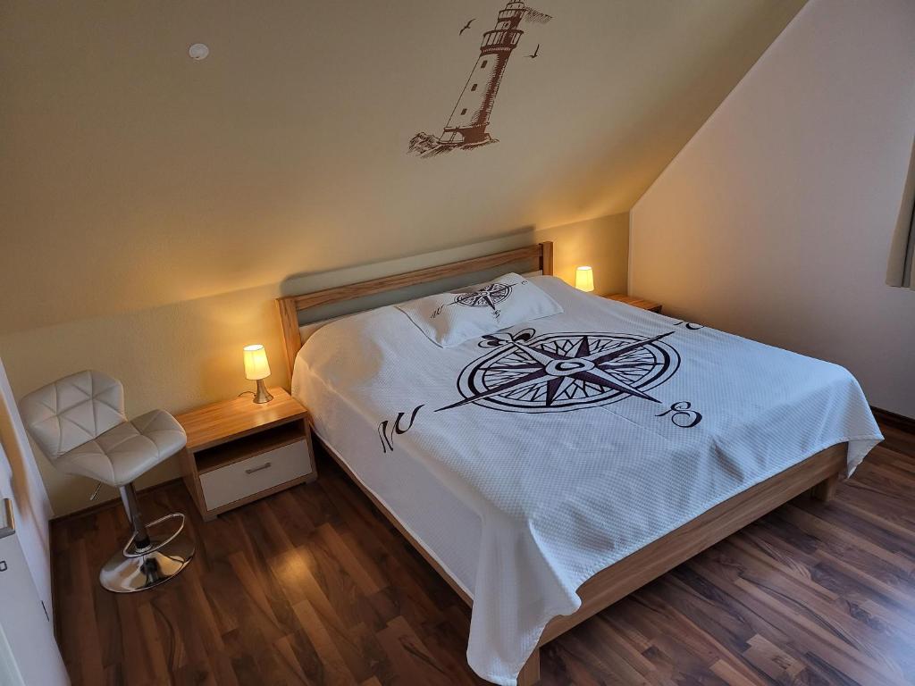 Postel nebo postele na pokoji v ubytování Anker Perla