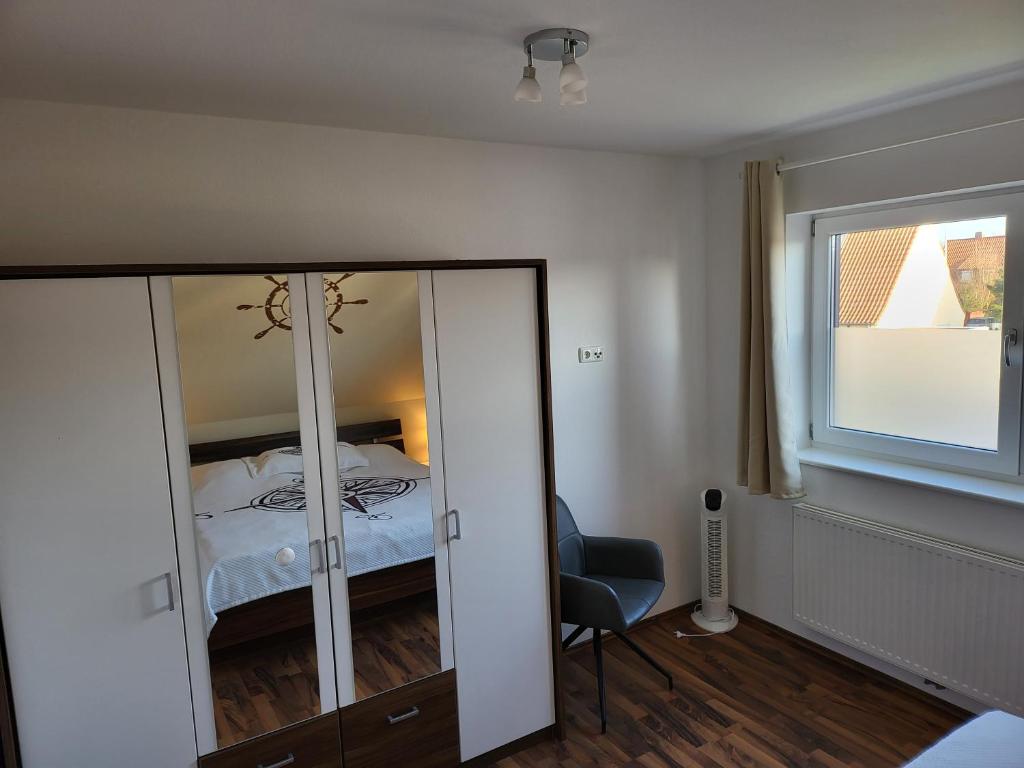 Postel nebo postele na pokoji v ubytování Anker Perla