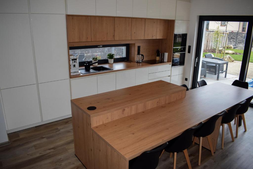 Kuchyň nebo kuchyňský kout v ubytování Apartmány Pod Novou