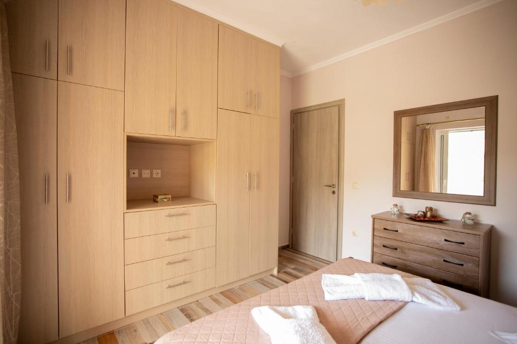 Postel nebo postele na pokoji v ubytování Nikorina apts