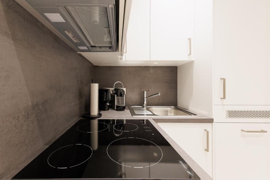 Kuchnia lub aneks kuchenny w obiekcie Vienna City Apartments Krongasse