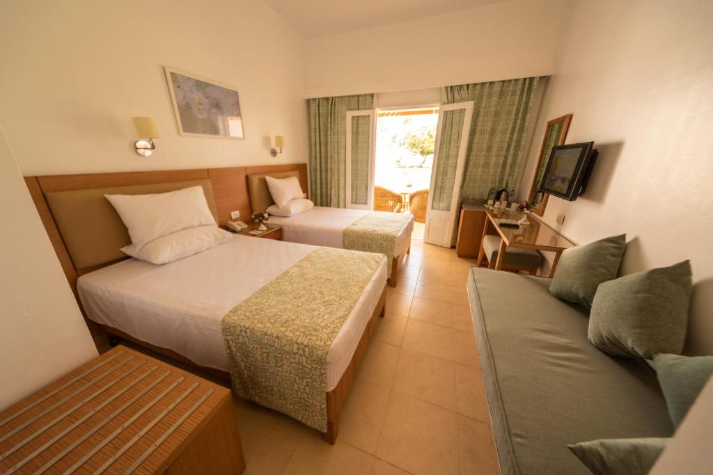 Postel nebo postele na pokoji v ubytování Dahab Lagoon Club & Resort Ex Tirana Dahab