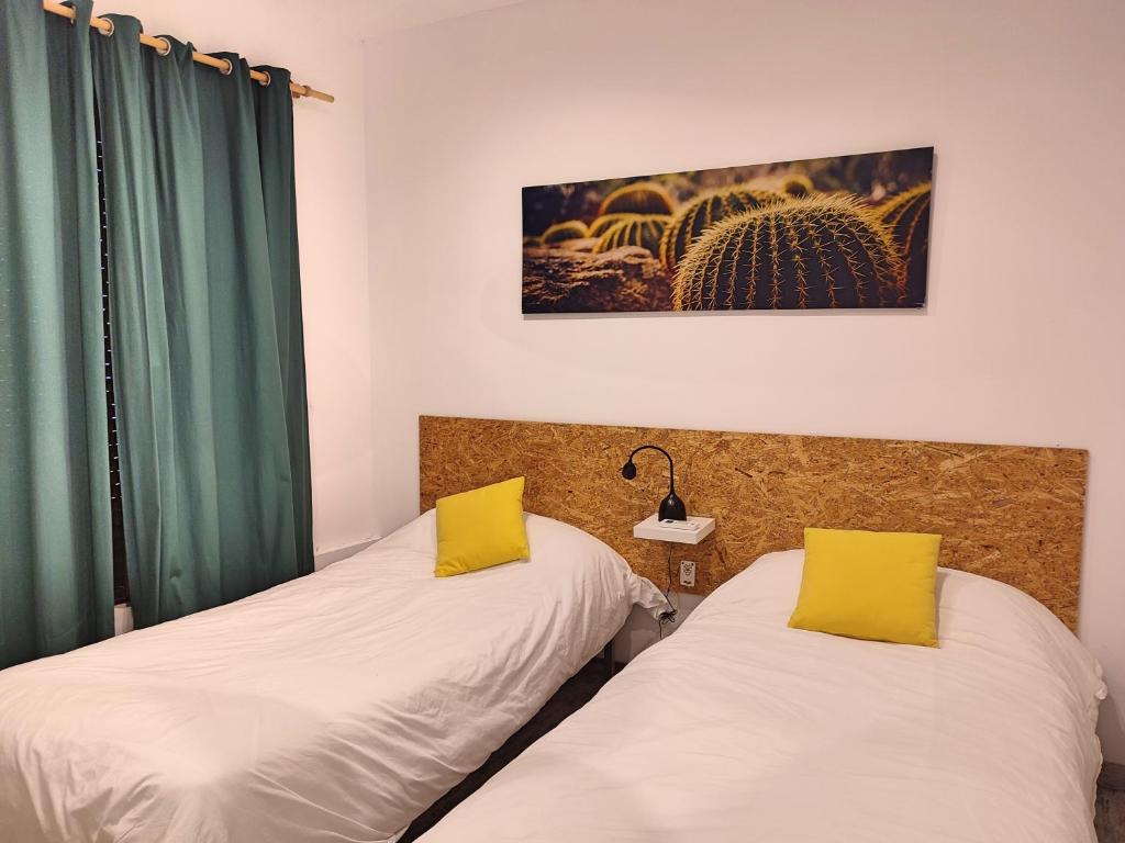 Posteľ alebo postele v izbe v ubytovaní La Casa de Pedro Verdugo Apartamento Turístico