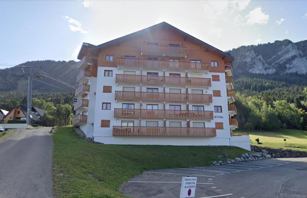 a large building with balconies on the side of it at Thollon-Les-Mémises - IGLOO 2 in Thollon