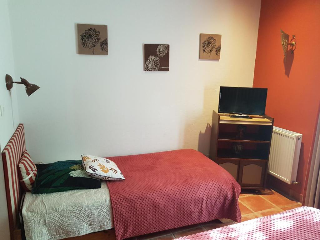 Postel nebo postele na pokoji v ubytování Domaine de Sahil