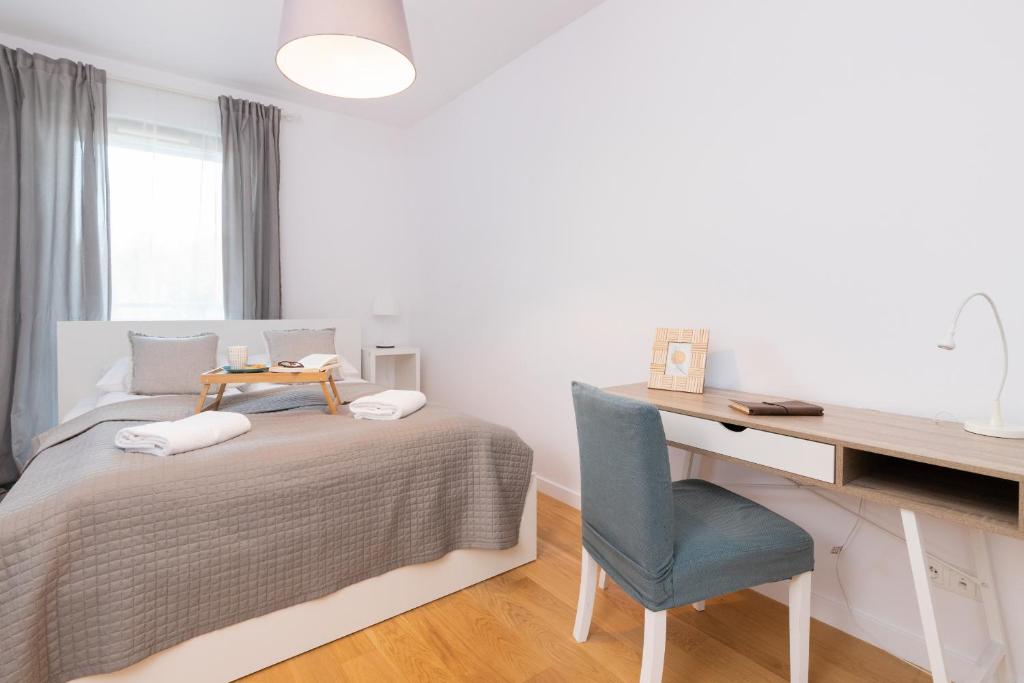 Postel nebo postele na pokoji v ubytování Legionów Apartment Gdynia Redłowo by Renters