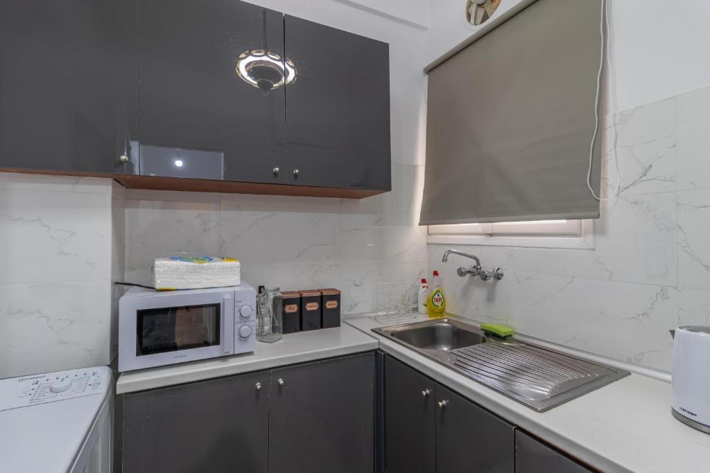 Kuchyňa alebo kuchynka v ubytovaní Studio Mélange in Loutraki DT