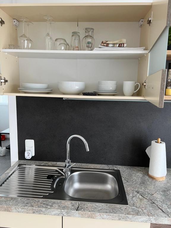 Kuchyň nebo kuchyňský kout v ubytování Apartment 1 Gäste