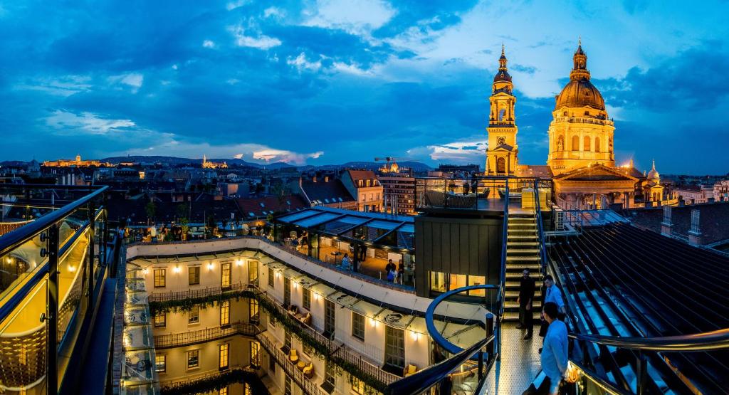 a view of the city of london at night at Aria Hotel Budapest by Library Hotel Collection in Budapest