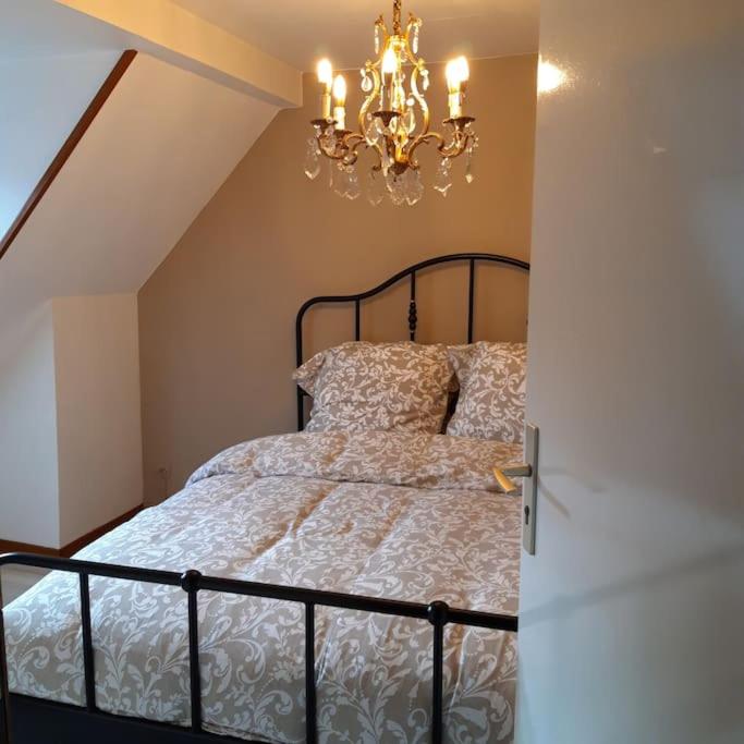 Posteľ alebo postele v izbe v ubytovaní Gîte Le3 Bergheim