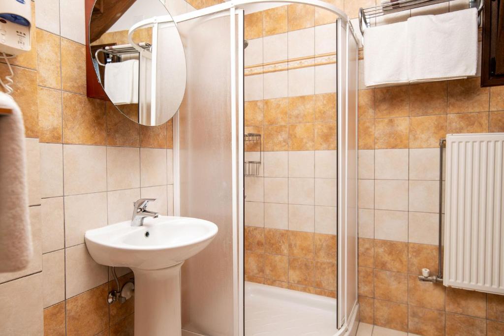 A bathroom at Olive Tree Villas