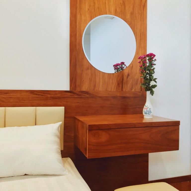 Postel nebo postele na pokoji v ubytování Đức Tuân 2 Motel