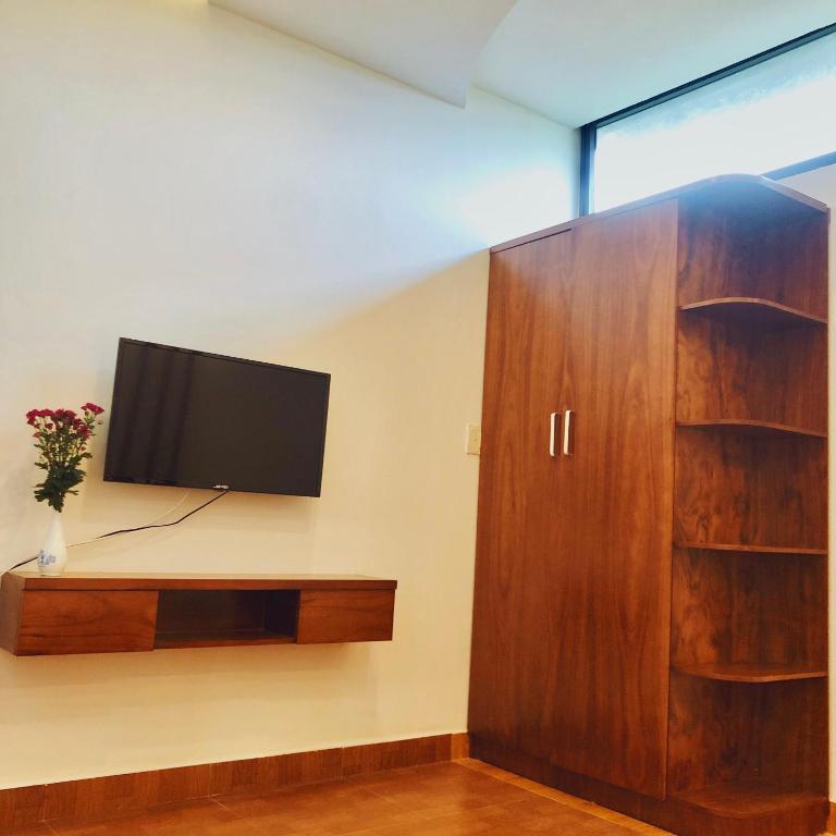 TV a/nebo společenská místnost v ubytování Đức Tuân 2 Motel