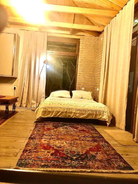 Postel nebo postele na pokoji v ubytování Batumi Wonderland