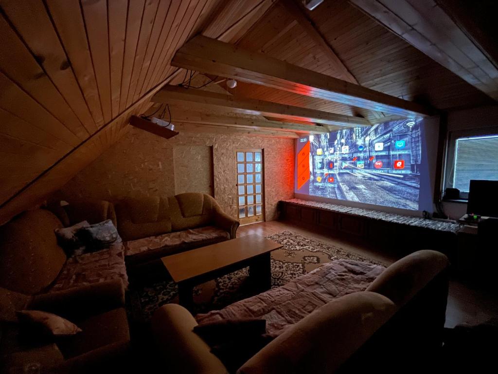 A television and/or entertainment centre at Ubytovanie v Rabčiciach