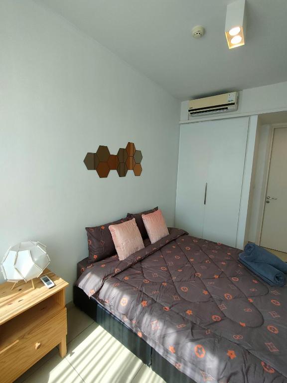 Postel nebo postele na pokoji v ubytování unixx seaview