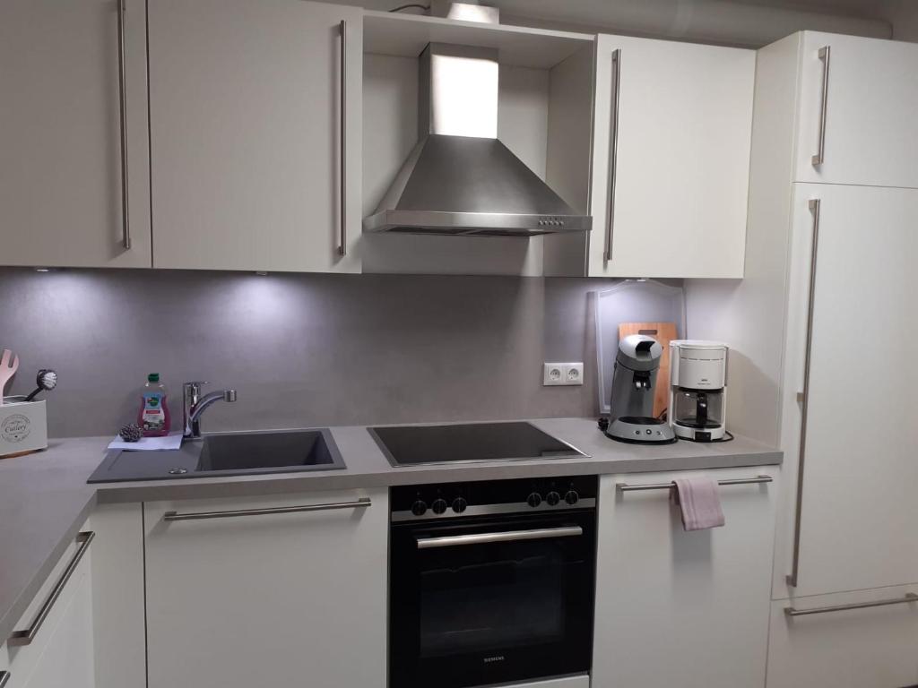 Kuchyň nebo kuchyňský kout v ubytování Haus Mühlenbach