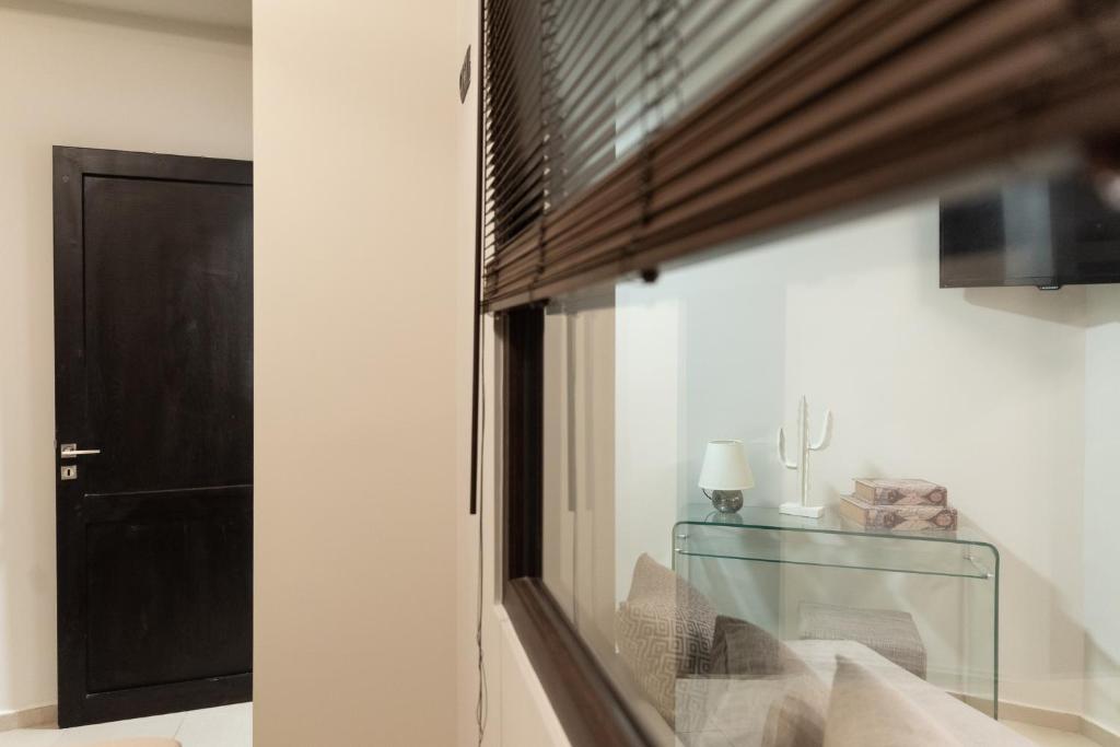TV a/nebo společenská místnost v ubytování Pasiphae Lux Apartment Downtown