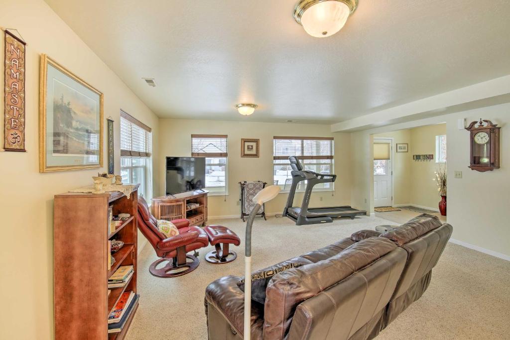 a living room with a couch and a gym at Pet-Friendly Montana Getaway Near Kayaking! in Missoula