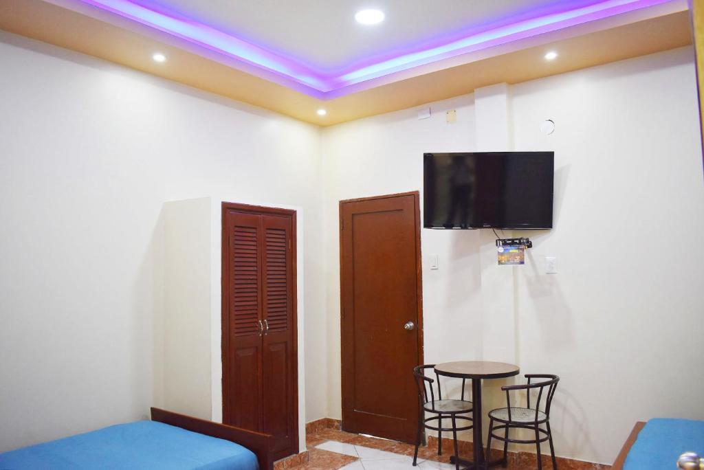 TV a/nebo společenská místnost v ubytování Hostal Galápagos - Guayaquil