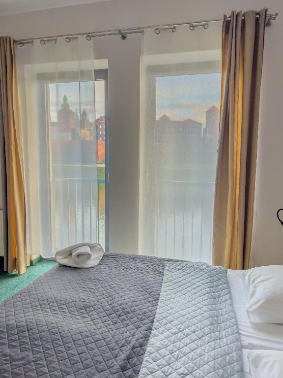 Postel nebo postele na pokoji v ubytování Hotel Poleski