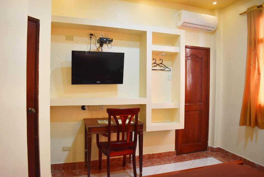 TV a/nebo společenská místnost v ubytování Hostal Galápagos - Guayaquil