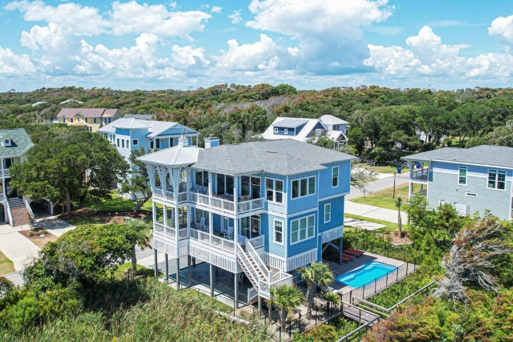 an aerial view of a house with a pool at Naut A Bad Gig in Oak Island