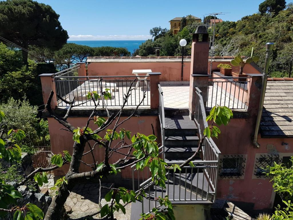 a view from the roof of a house with stairs at Casa zagare sul mare in Levanto