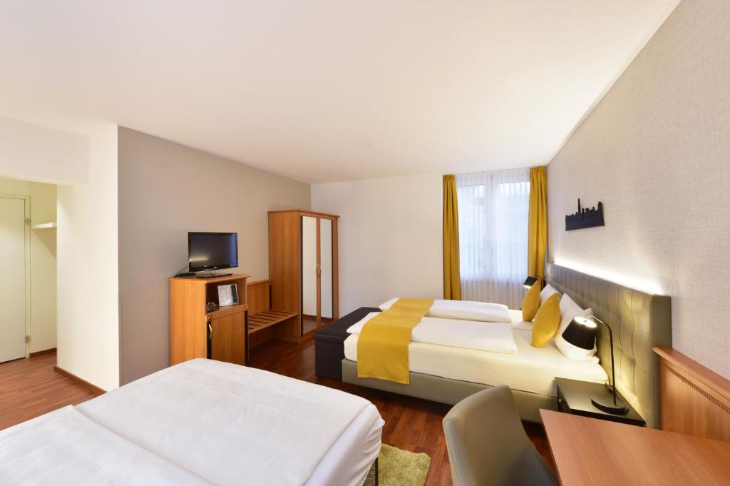 Postel nebo postele na pokoji v ubytování Hotel Engel