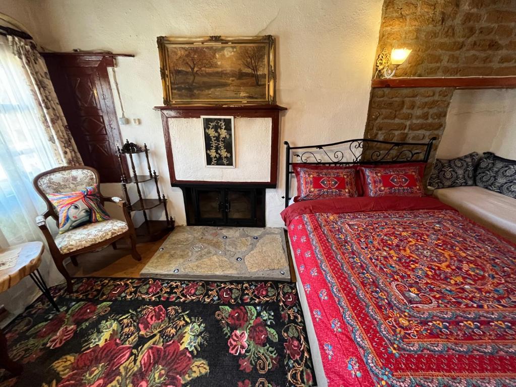 A bed or beds in a room at Mystic Konak
