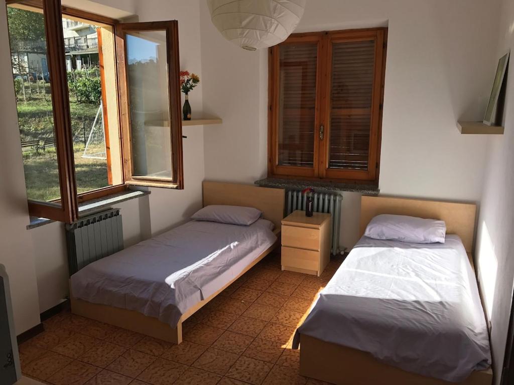 A bed or beds in a room at Casa Roberto Pool with Bar 5 bedrooms 2 bathrooms Great For Groups