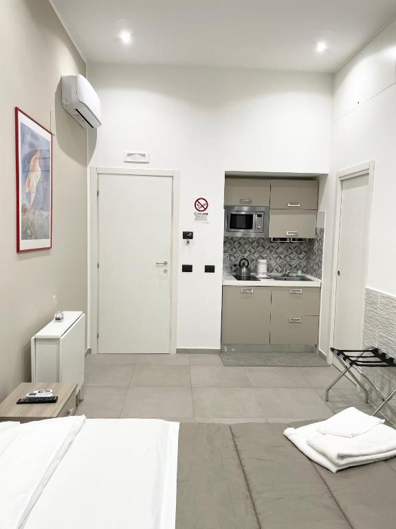 Kuchyňa alebo kuchynka v ubytovaní Room25mq
