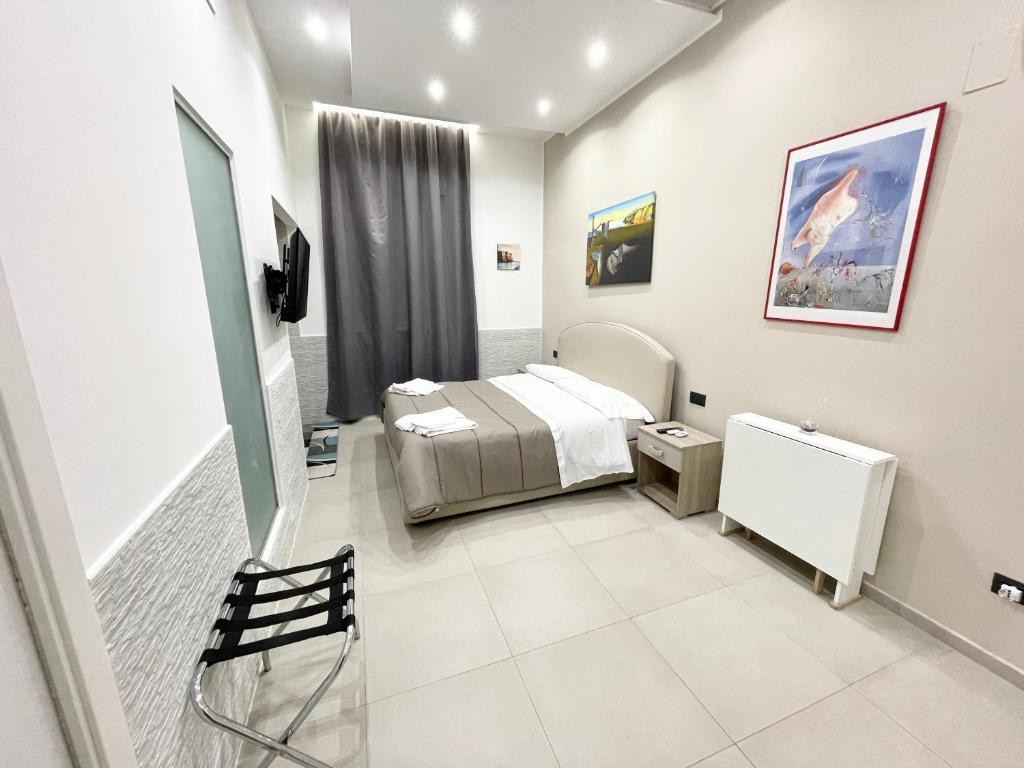 Posteľ alebo postele v izbe v ubytovaní Room25mq
