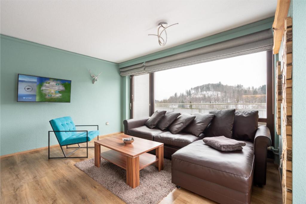 Posezení v ubytování Penthouse Falkennest