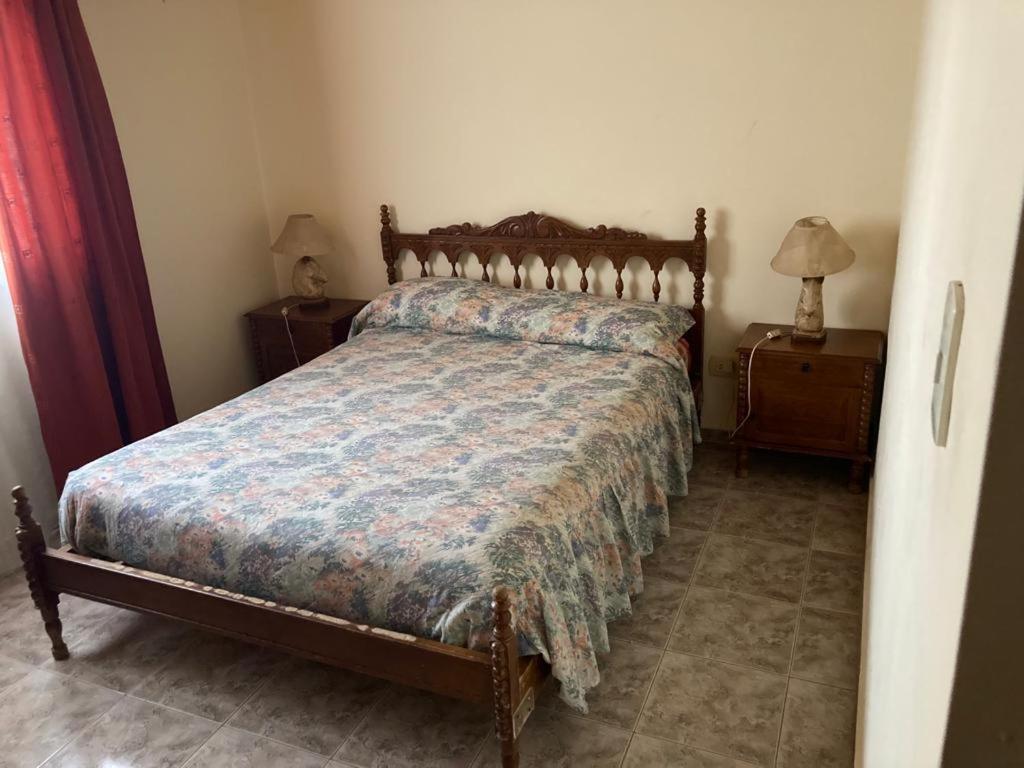 Кровать или кровати в номере KARUKO