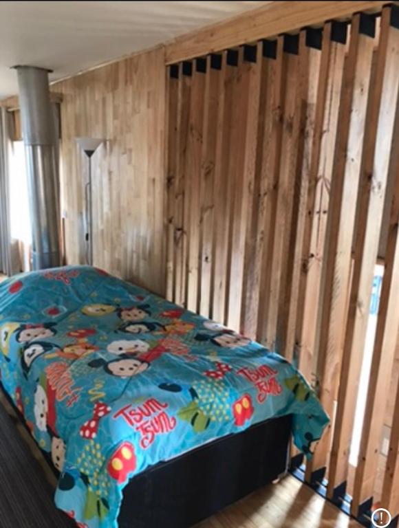Postel nebo postele na pokoji v ubytování Cabañas Tinajas hidromasaje Chanlelfu