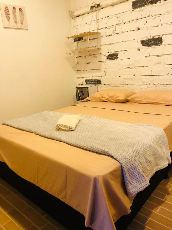 Postel nebo postele na pokoji v ubytování Casa Egos Pop Laureles