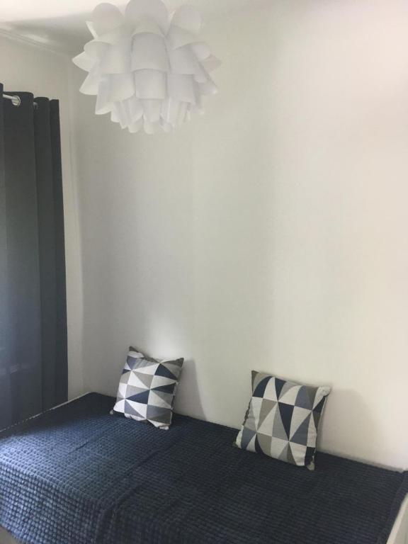 Posteľ alebo postele v izbe v ubytovaní SZINYEI APARTMAN