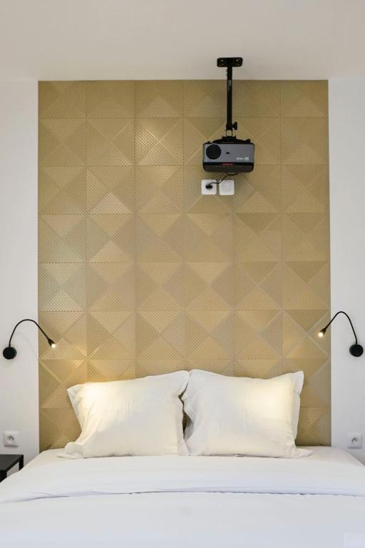 Fotografia z galérie ubytovania NG SuiteHome - Lille I Roubaix Gare I Lorraine - Maison 2 chambres - Balnéo - Netflix - Wifi - Jardin v destinácii Roubaix