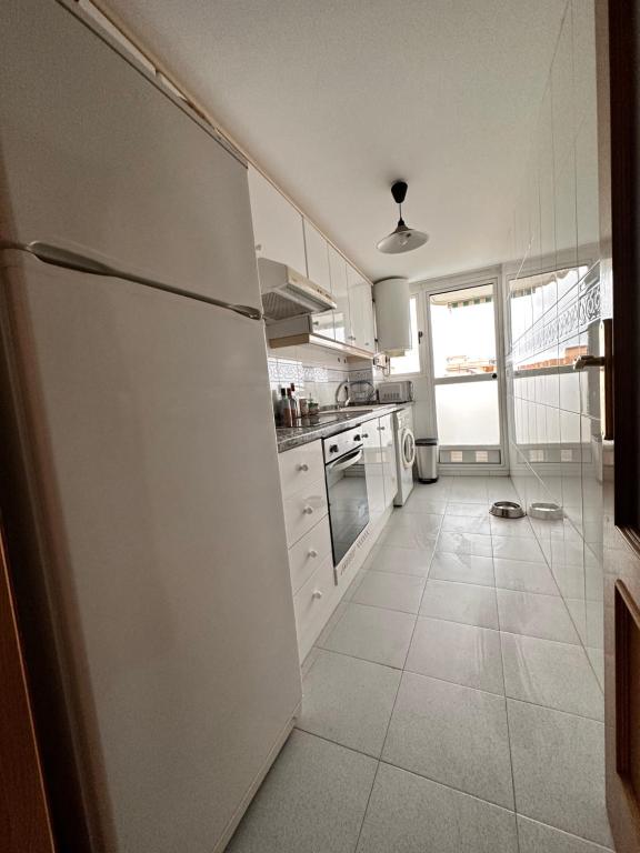 Kuchyň nebo kuchyňský kout v ubytování Precioso apartamento con piscina