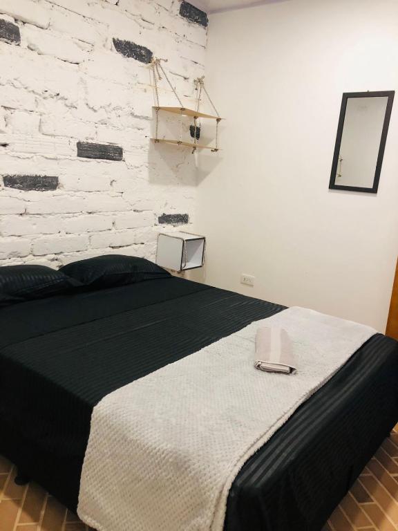 Postel nebo postele na pokoji v ubytování Casa Egos Pop Laureles
