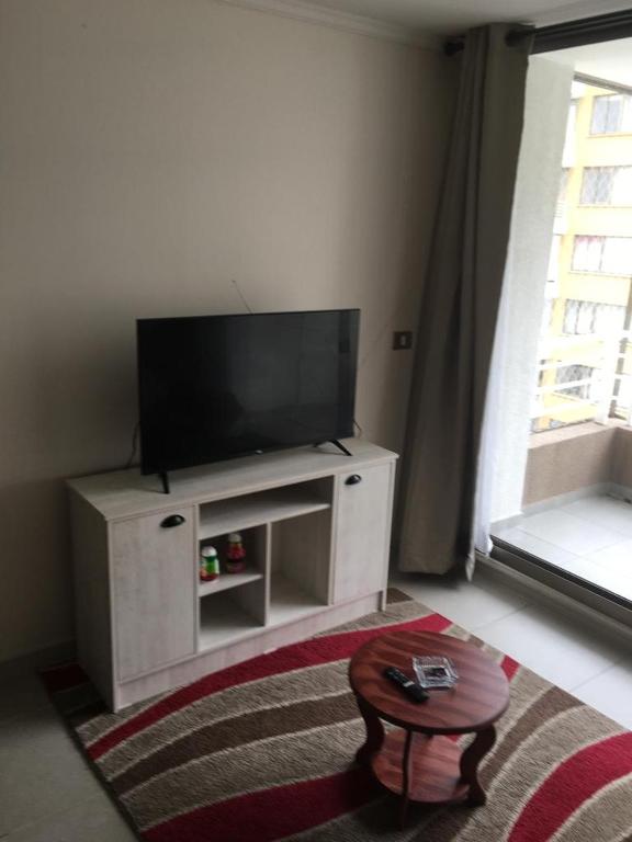 TV a/nebo společenská místnost v ubytování DPTO Valparaiso