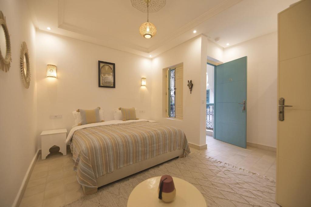 Postel nebo postele na pokoji v ubytování Riad l'Esprit des Patios & Spa