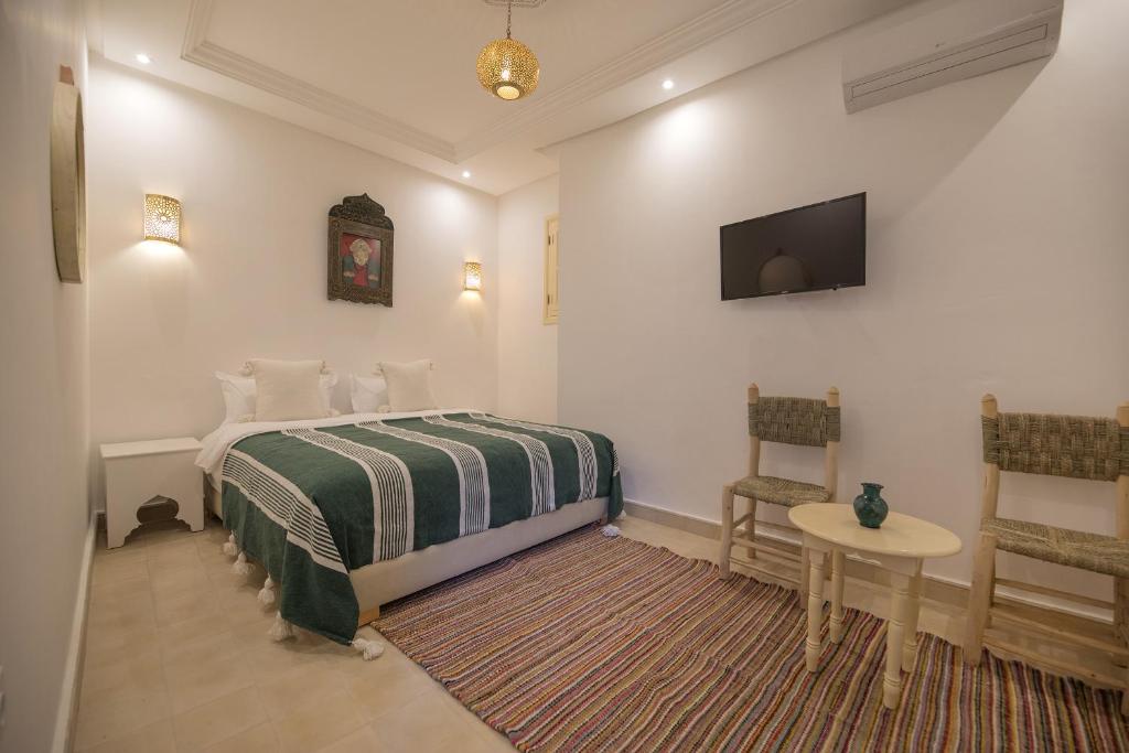 Postel nebo postele na pokoji v ubytování Riad l'Esprit des Patios & Spa