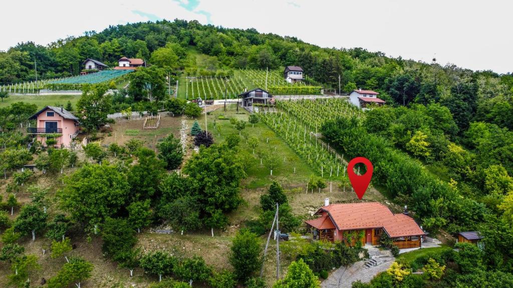 een zicht vanuit de lucht op een boerderij met een rode markering erop bij Holiday house with a parking space Krapina, Zagorje - 20452 in Krapina